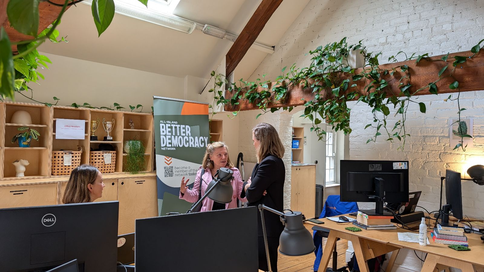 Members of the All-Island Better Democracy Network having a conversation in the Codema office